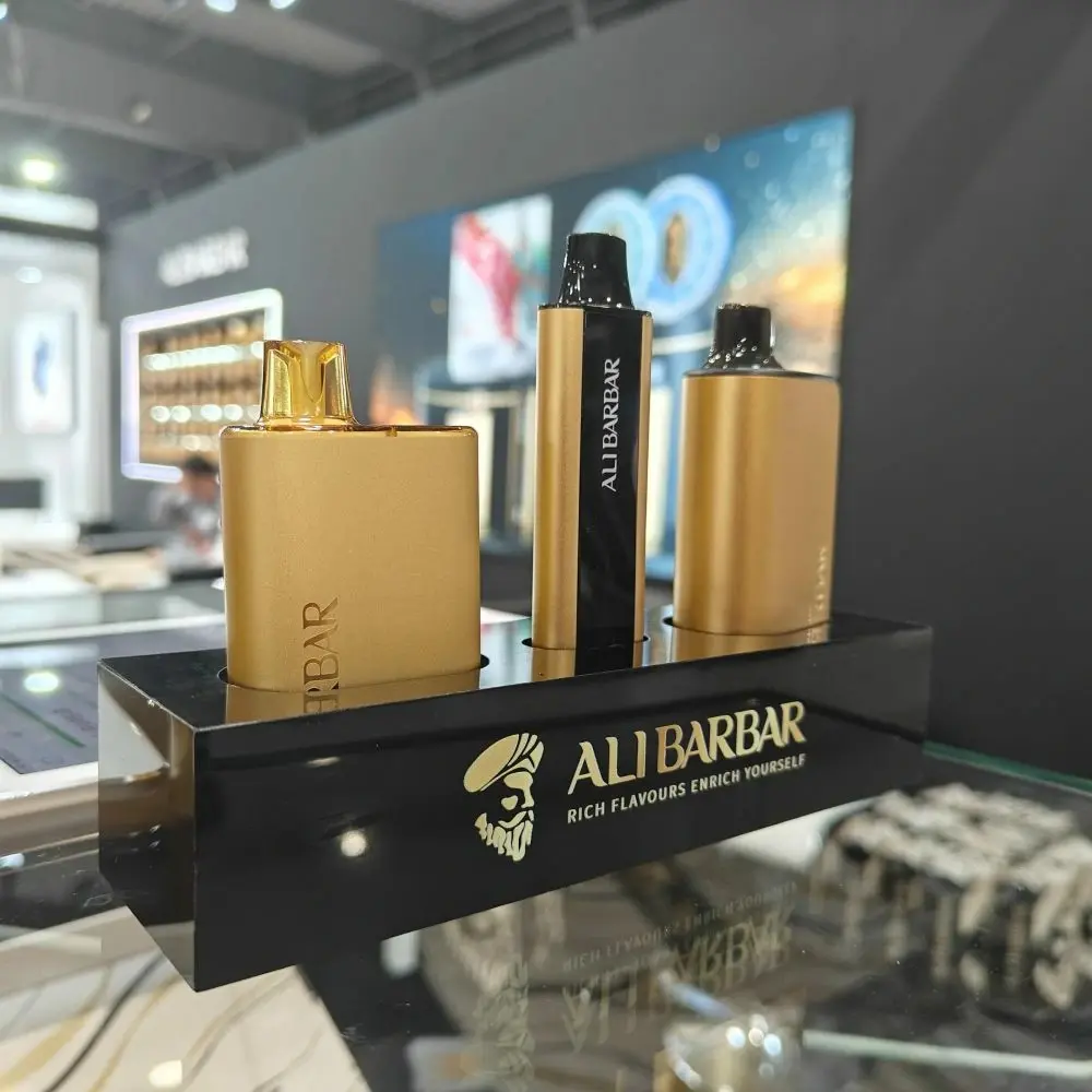 Variety of Alibarbar vape flavours displayed with colourful packaging