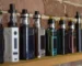 Person shopping for vapes on a laptop with vape products on screen
